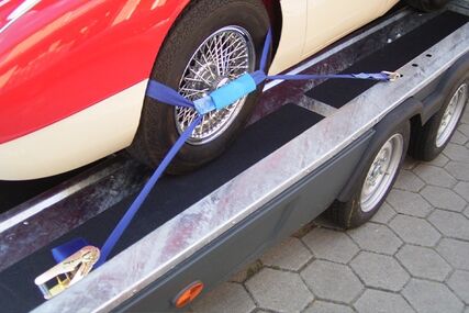 Upínací popruhy přes kola